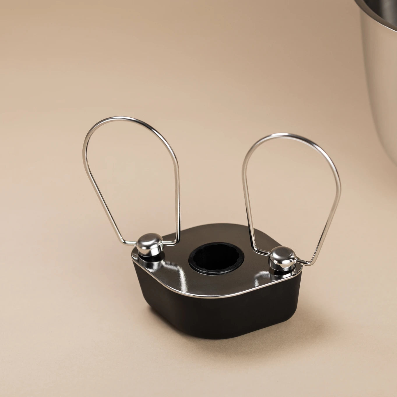 The Kitchen Table Ankarsrum beater housing with stainless steel balloon whisks attached for stand mixer baking
