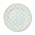 The Kitchen Table enamel dinner plate with a hand-painted blue and white checkered pattern and bronze-tone rim.
