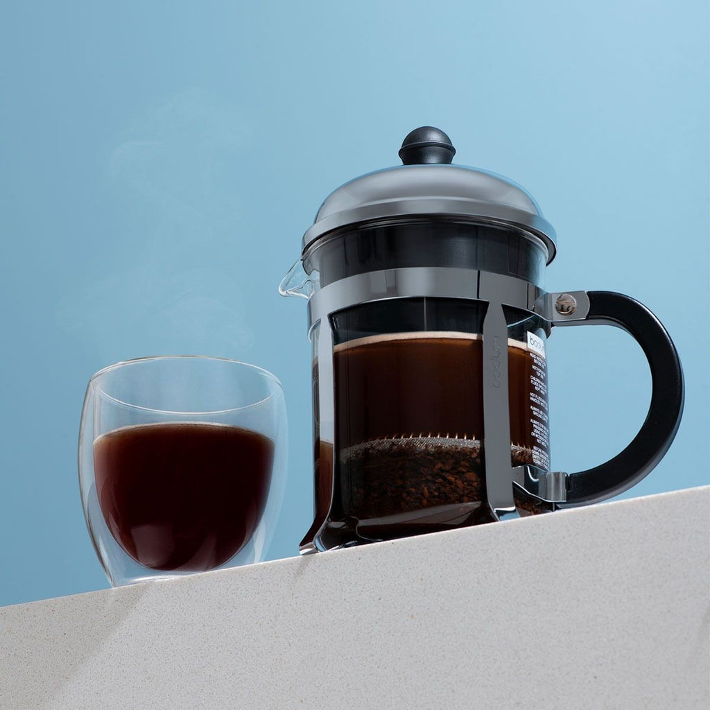 The Kitchen Table Bodum Chambord 4 cup French press coffee maker with a glass carafe and stainless steel frame