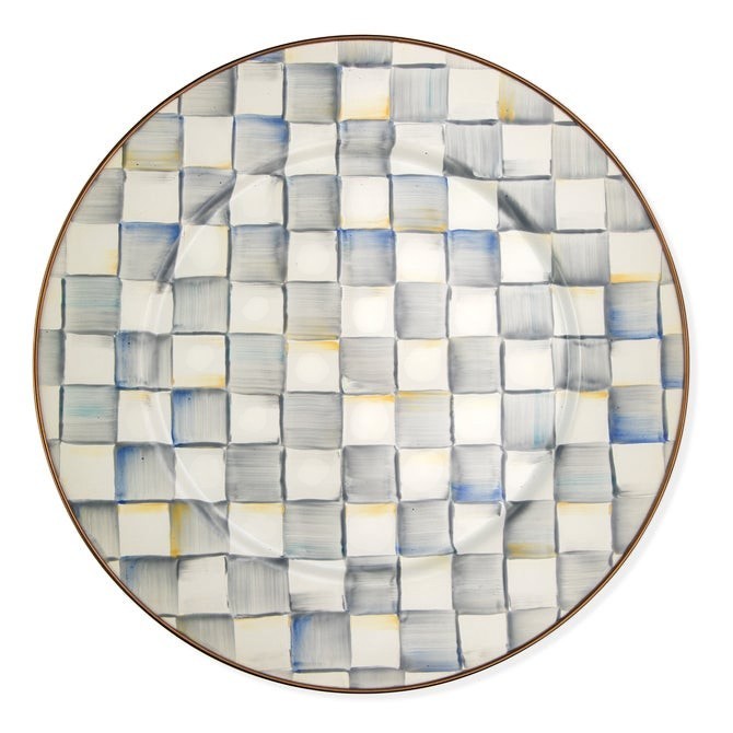 The Kitchen Table Courtly Check enamel dinner plate with a hand-painted blue, grey, and white checkered pattern.