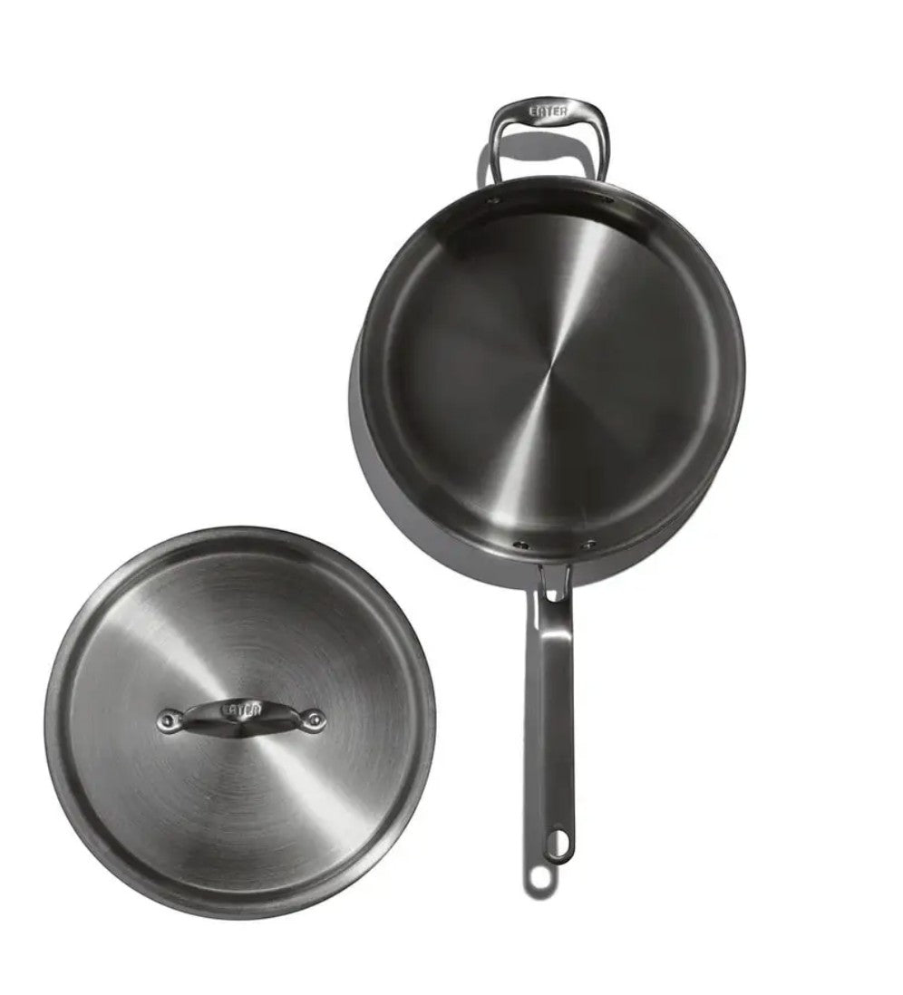 The Kitchen Table EATER 4 quart stainless steel sauté pan with matching lid shown from a top-down perspective.