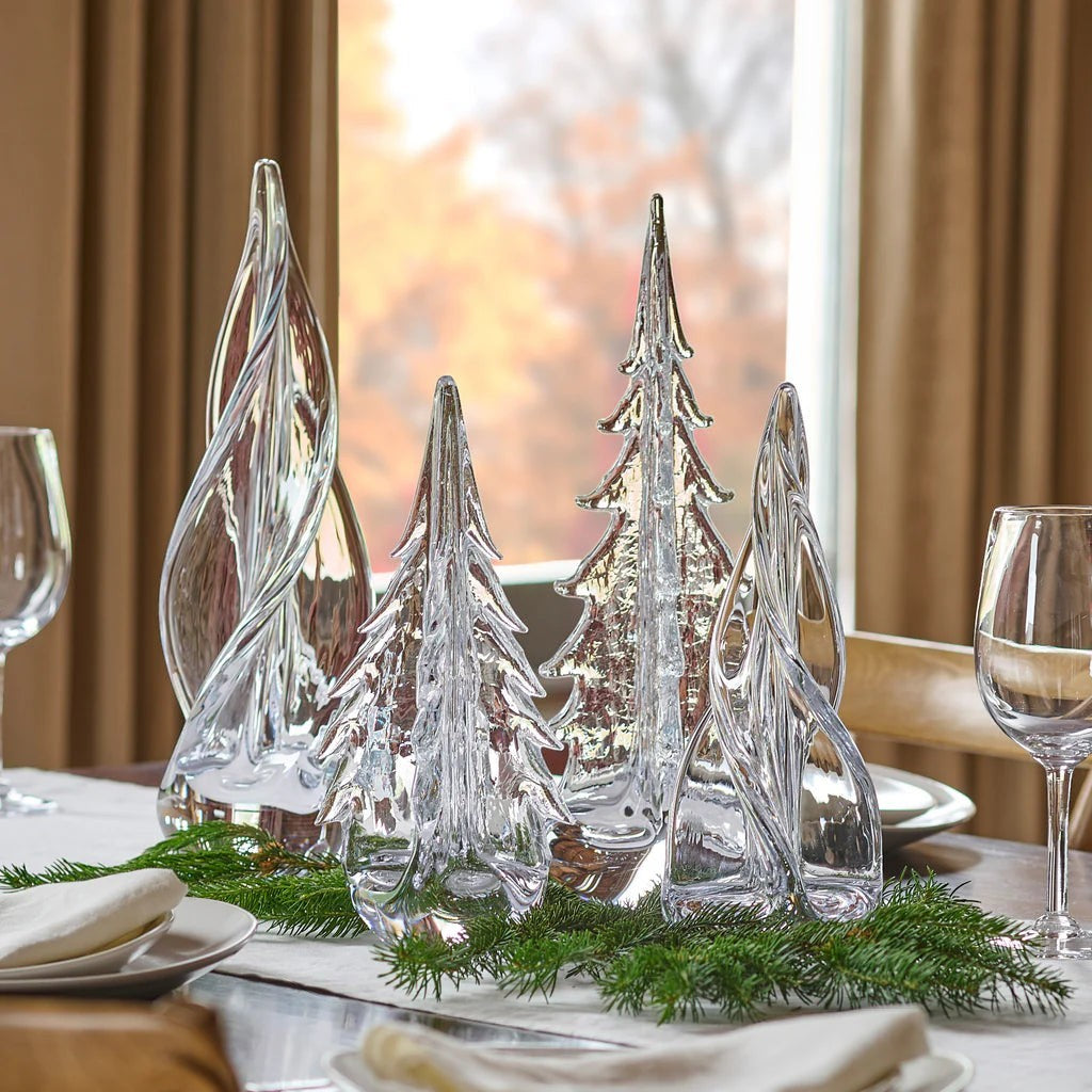 The Kitchen Table glass spiral evergreen trees in clear hand-formed crystal on a festive dining table centerpiece.