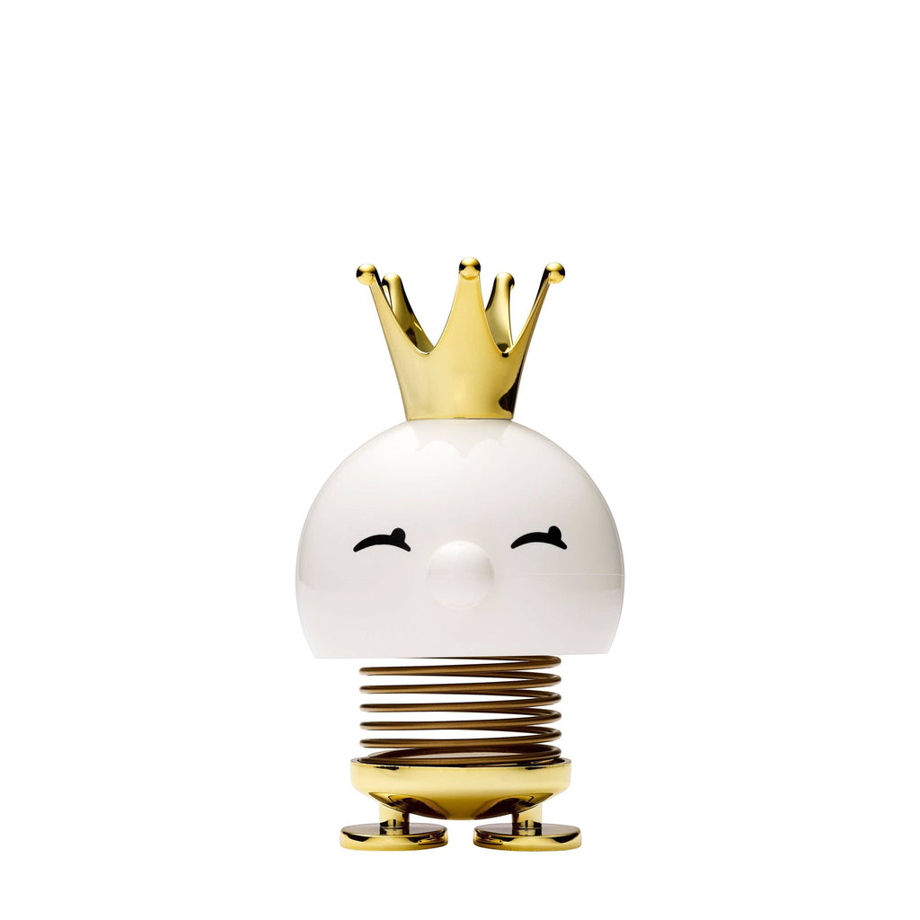 The Kitchen Table Hoptimist Queen figurine in white with a shiny gold crown and matching gold spring base.