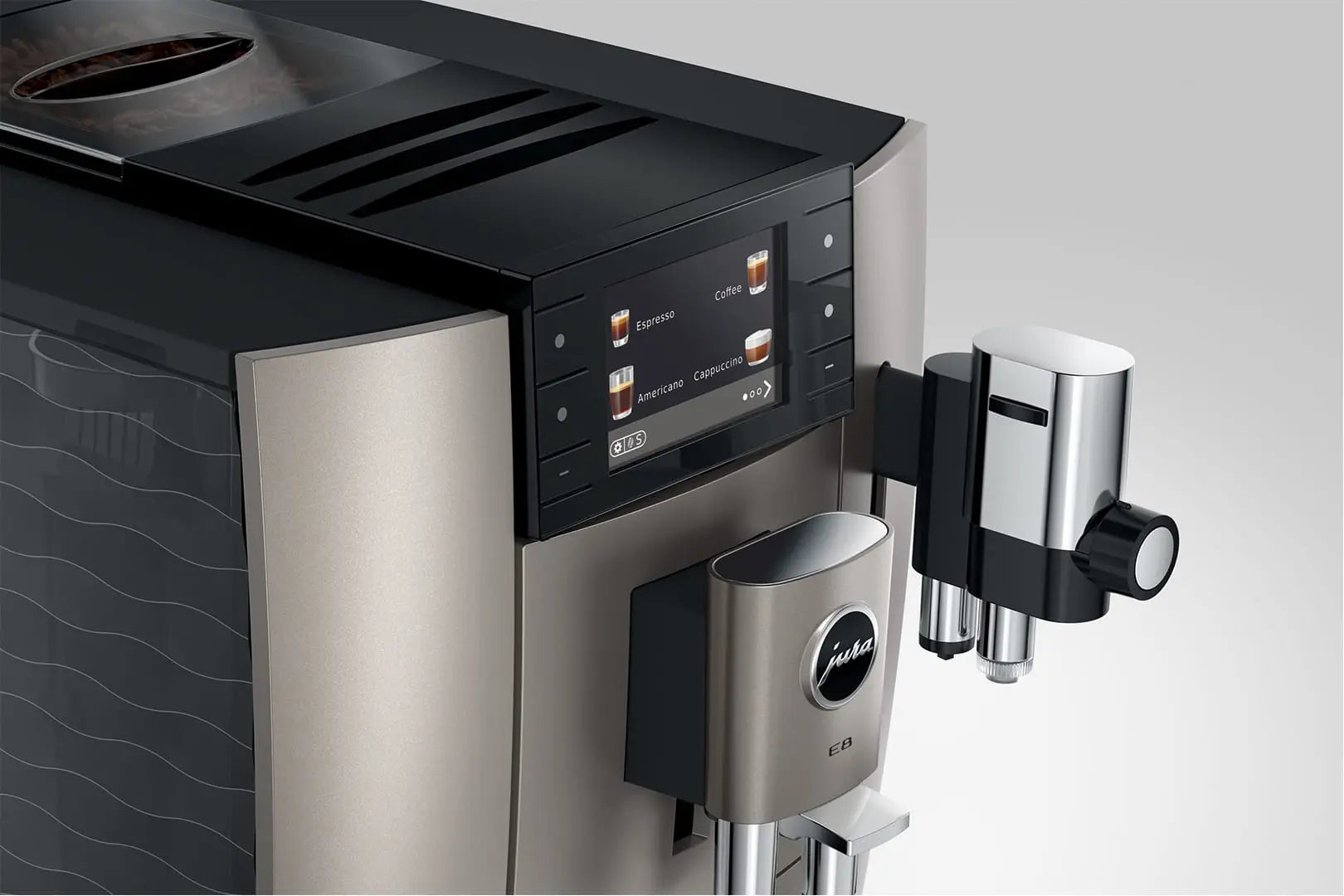 The Kitchen Table Jura E8 Midnight Silver automatic coffee machine showing the digital touchscreen and milk frother.