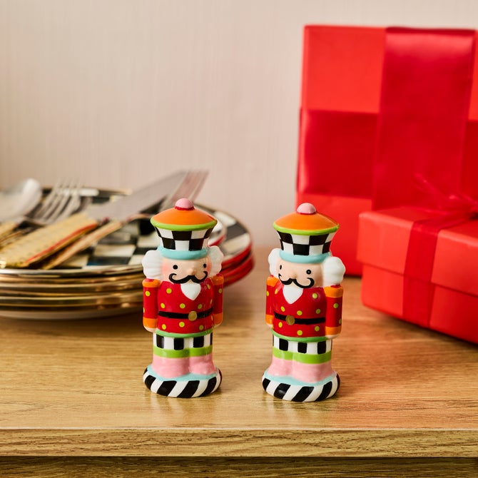 The Kitchen Table ceramic Confetti Nutcracker salt and pepper shakers with colorful stripes, checks, and polka dots.