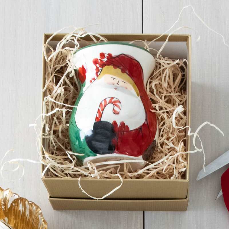 The Kitchen Table Old St. Nick ceramic bud vase featuring a hand-painted Santa Claus design in a gift box.