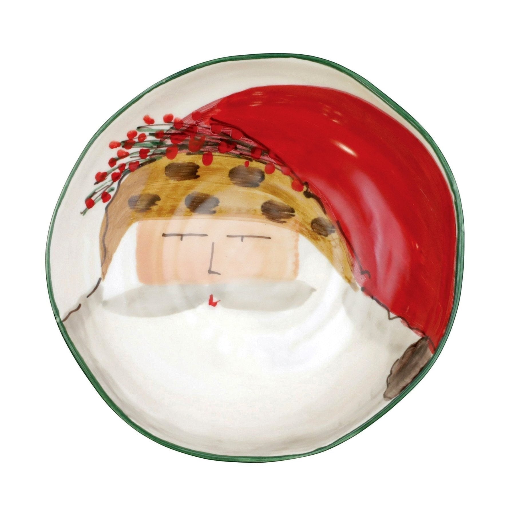 Vietri hand-painted ceramic pasta bowl featuring Papa Natale in an animal print hat with holly.