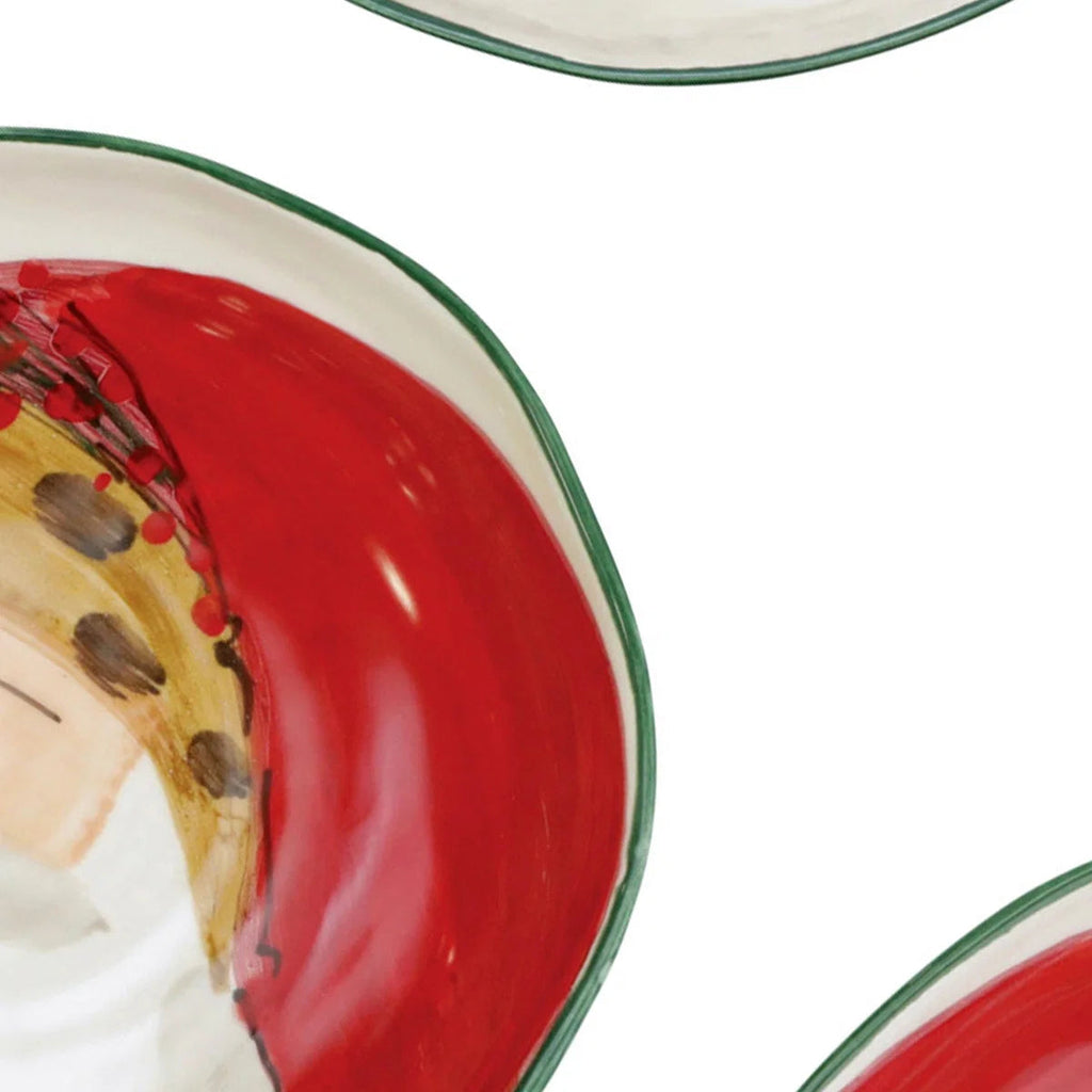 The Kitchen Table Old St. Nick pasta bowls featuring hand-painted Babbo Natale Santa Claus in red and green holiday hues