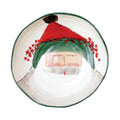 Vietri hand-painted ceramic pasta bowl featuring Papa Natale with a red hat and green trim.