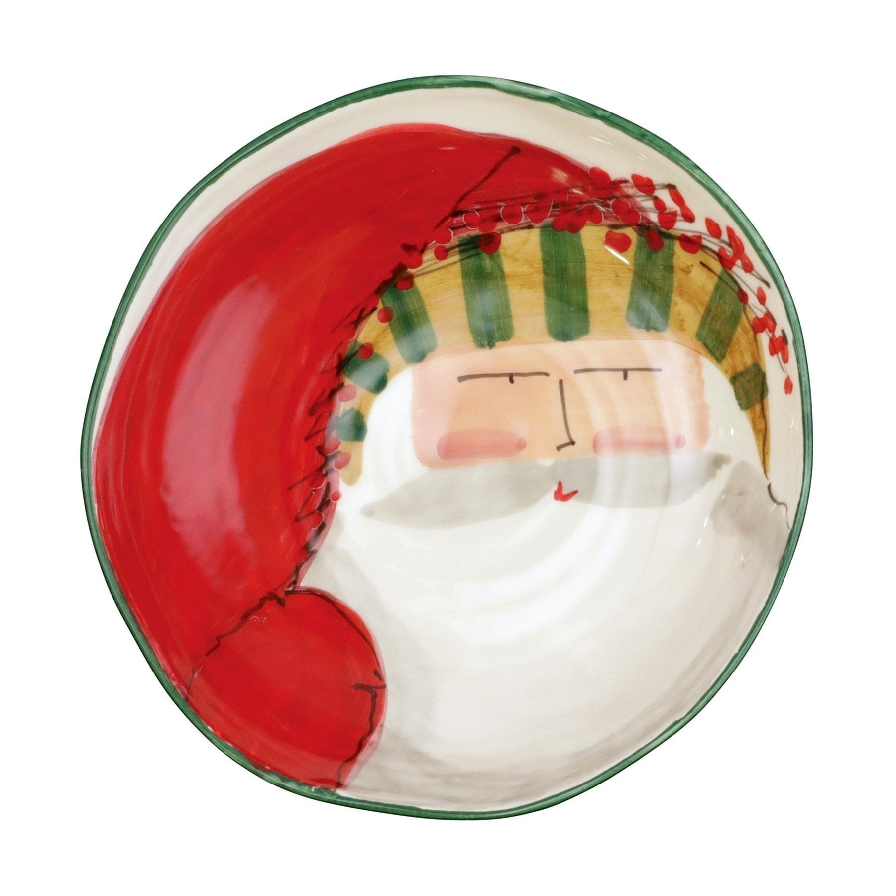 Vietri hand-painted ceramic pasta bowl featuring a whimsical Santa Claus design with a green striped rim.