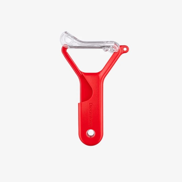 The Kitchen Table Sharple Y-Peeler in bright red with a clear protective cover for self-sharpening kitchen use.