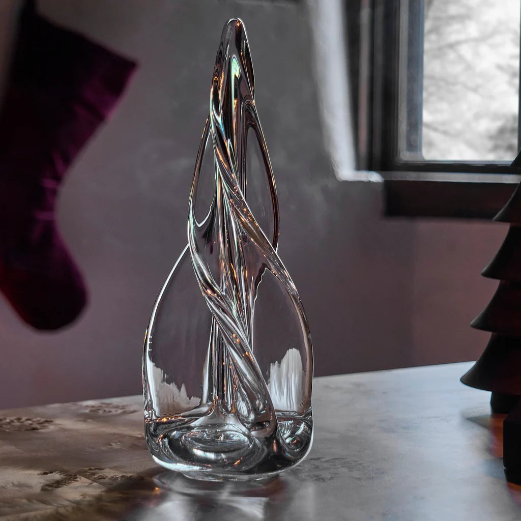 The Kitchen Table hand-formed clear glass four-sided evergreen sculpture with a dynamic spiral flame design.
