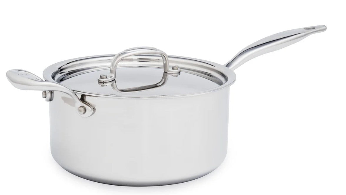 The Kitchen Table 4 quart stainless steel saucepan with a polished finish, riveted handle, and a tight-fitting lid.