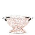 The Kitchen Table 1 quart colander in taupe swirl enamelware with a pedestal base and two side handles.